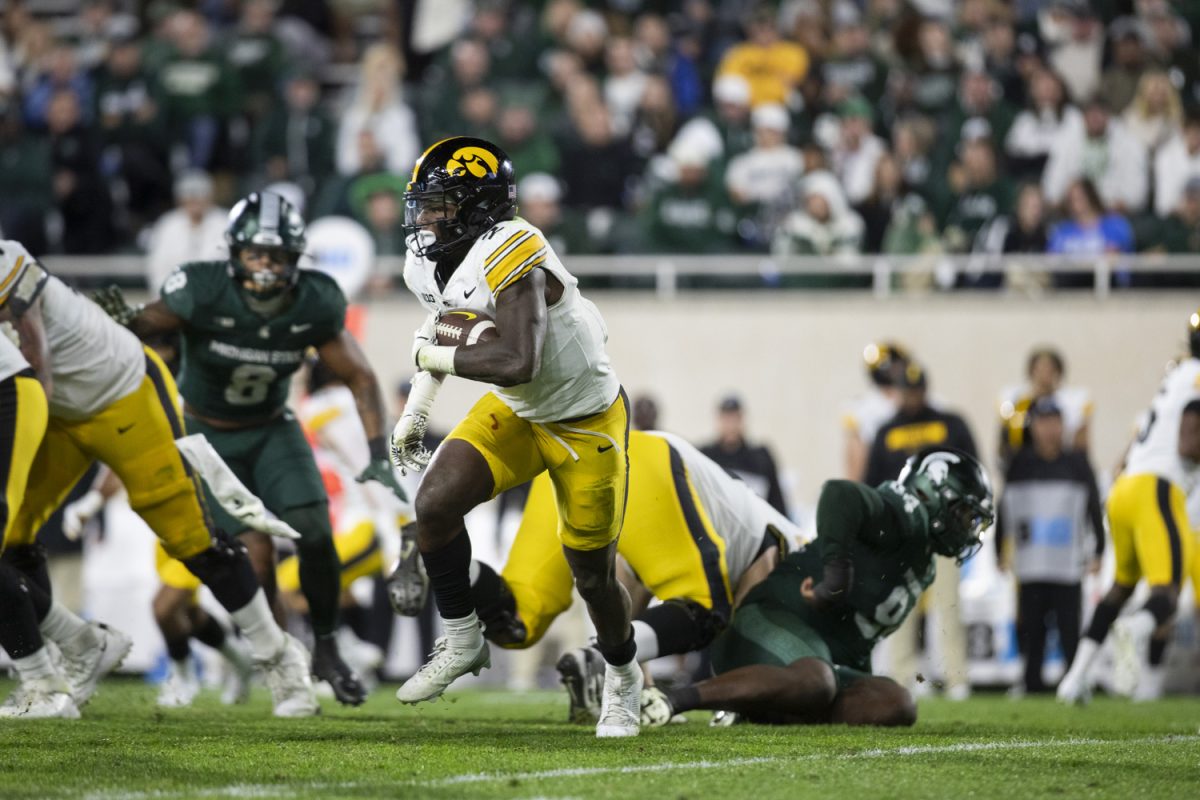 Iowa running back Kaleb Johnson runs the ball during a game between the Iowa and Michigan State at Spartan Stadium in East Lansing, Mich., on Saturday, Oct. 19, 2024. The Spartans defeated the Hawkeyes, 32-20.