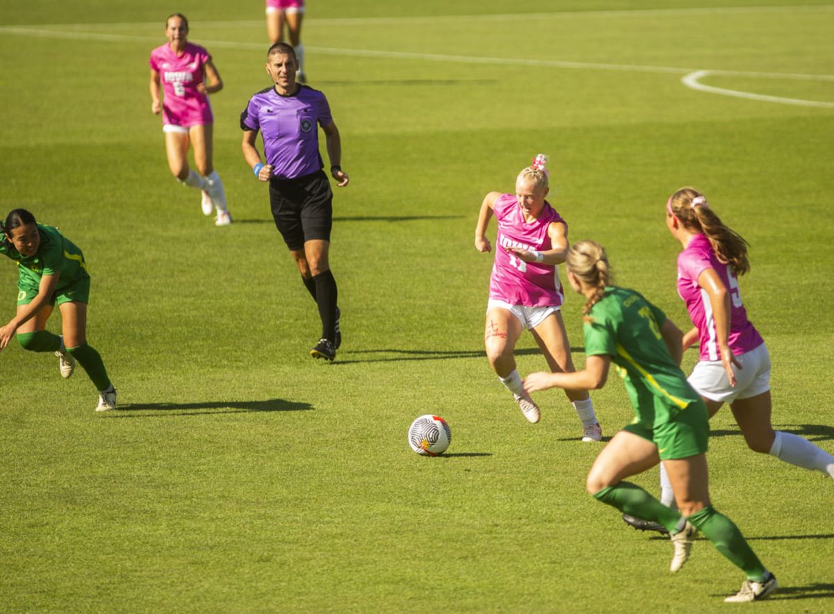 Iowa midfielder Kellen Fife moves the ball down the field during a soccer game between No. 7 Iowa and Oregon at the University of Iowa Soccer Complex on Sunday, Oct. 20, 2024. The Hawkeyes defeated the Ducks 4-0. (Emily Nyberg/The Daily Iowan)