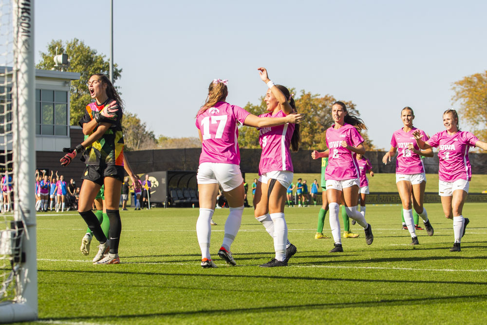 Iowa players celebrate a goal by Iowa forward Delaney Holtey during a soccer game between No. 14 Iowa and Oregon at the University of Iowa Soccer Complex on Sunday, Oct. 20, 2024. The Hawkeyes defeated the Ducks 4-0. 