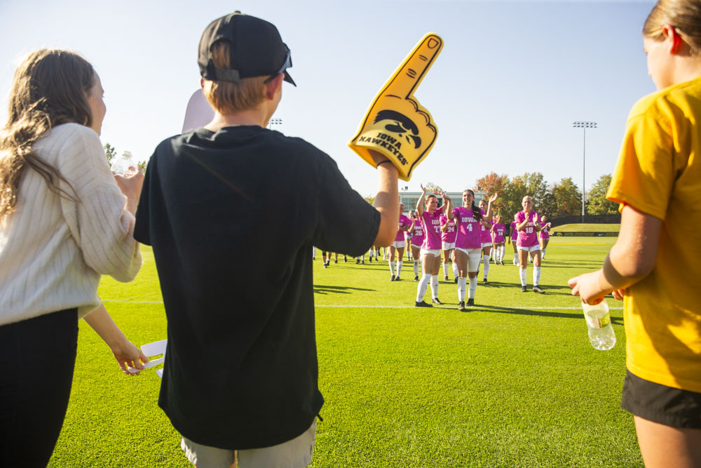 Iowa players wave to fans after a soccer game between No. 14 Iowa and Oregon at the University of Iowa Soccer Complex on Sunday, Oct. 20, 2024. The Hawkeyes defeated the Ducks 4-0. 