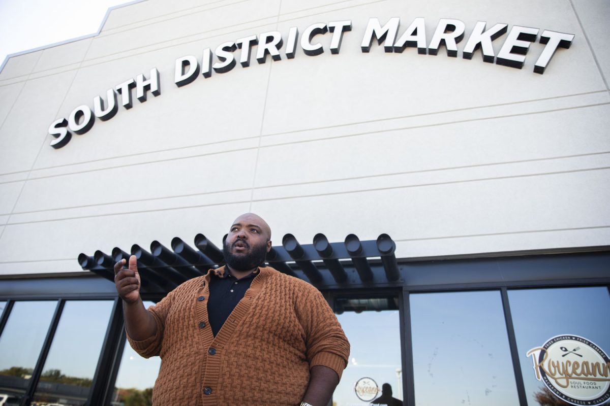 South of 6 Executive Director Maurice Davis speaks outside of the South District Market building in Iowa City on Oct. 21. The South of 6 is a nonprofit that supports economic development, infrastructure growth, and community events.