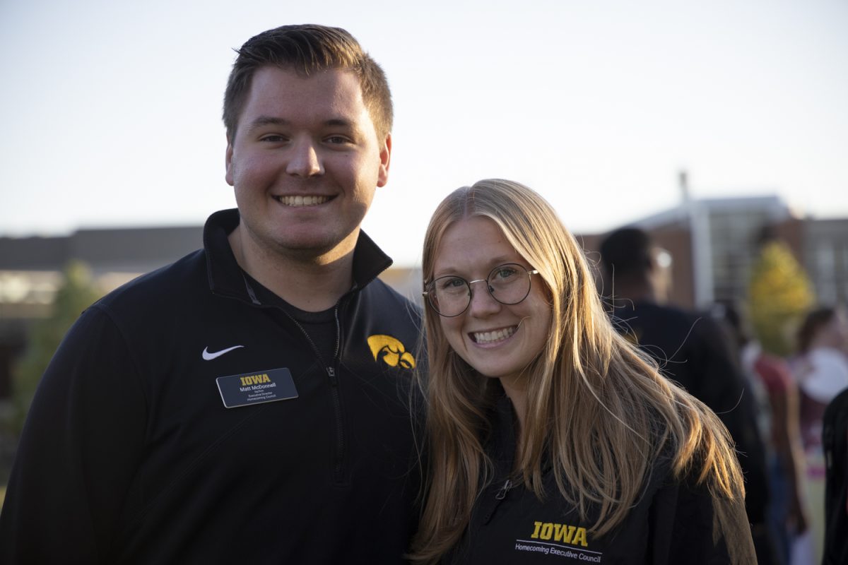 University of Iowa homecoming Executive Directors Matt McDonnell (left) and Abbie Townsend (right) pose for a portrait during the homecoming’s multi-cultural block party at Hubbard Park in Iowa City on Oct. 23. McDonnell is a fourth-year student majoring in biomedical engineering and cinema, and Abbie Townsend is also a fourth-year student majoring in neuroscience. 