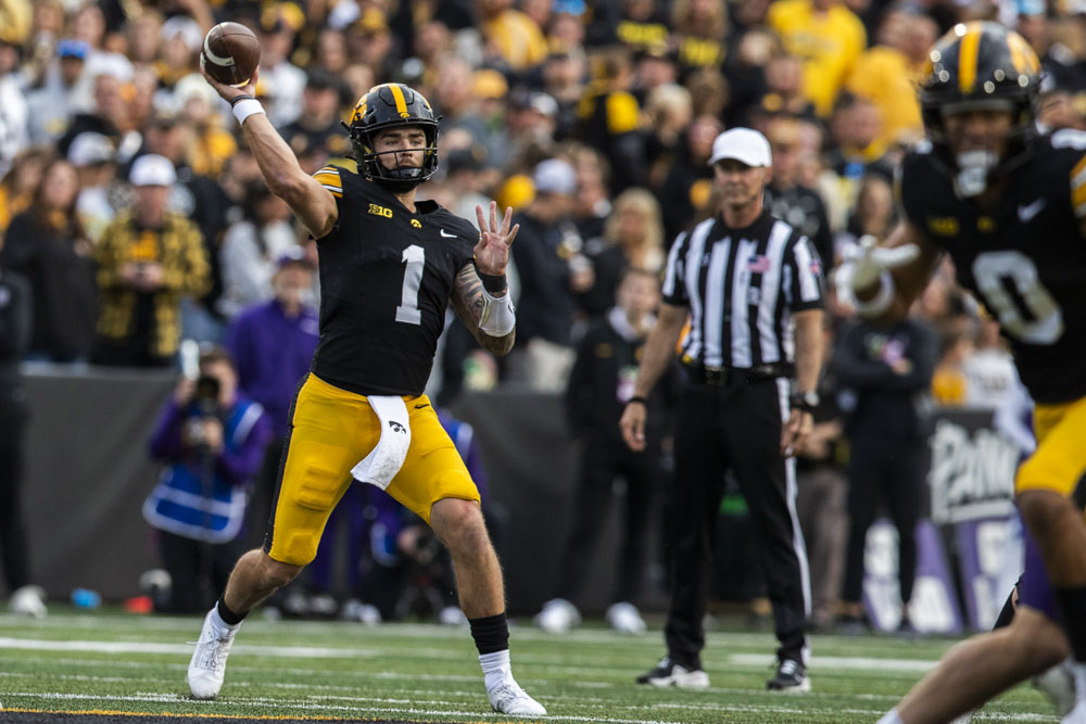 Iowa quarterback Brendan Sullivan throws the ball during a game between Iowa and Northwestern at Kinnick Stadium on Saturday, Oct. 26, 2024. The Hawkeyes defeated the Wildcats 40-14.