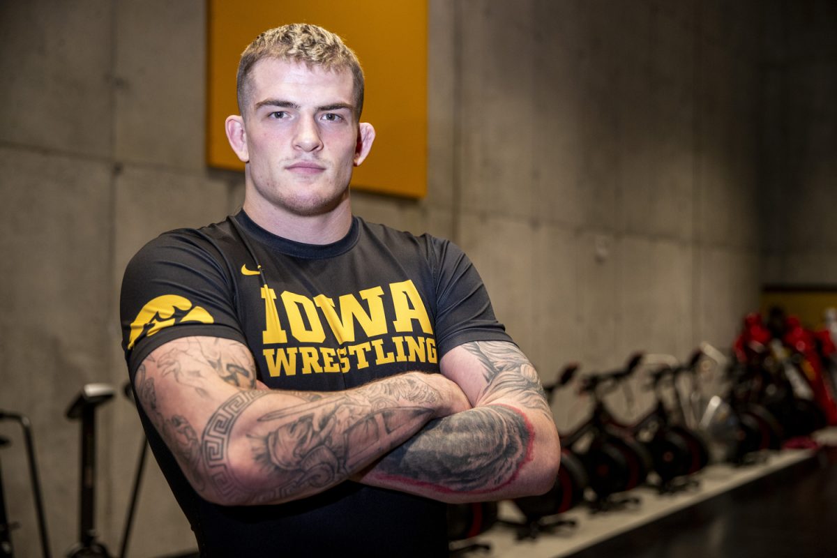 Iowa 285-pound Ben Kueter poses for a portrait during men’s wrestling media day at Carver-Hawkeye Arena in Iowa City, on Thursday Oct. 31, 2024. The Hawkeyes will begin their season on the road against the Oregon State Beavers on Saturday, Nov. 2, in Corvallis, Ore.