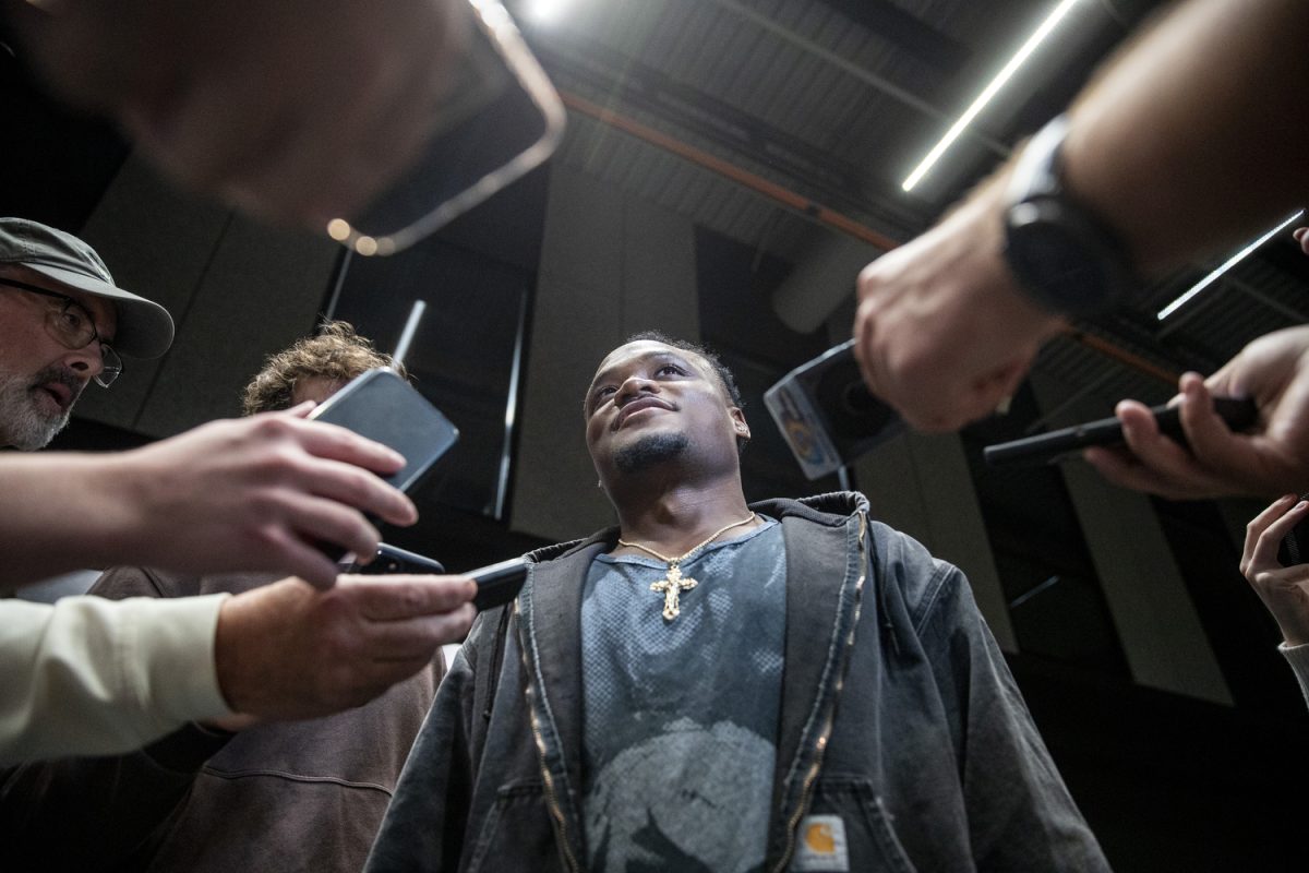 Media members interview Iowa 157-pound Jacob Teemer during men’s wrestling media day at Carver-Hawkeye Arena in Iowa City, on Thursday Oct. 31, 2024. The Hawkeyes will begin their season on the road against the Oregon State Beavers on Saturday, Nov. 2, in Corvallis, Ore.