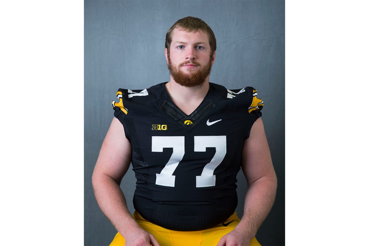 Iowa Hawkeyes offensive linesman Reid Sealby (77) Monday, Aug. 4, 2014 at the Hayden Fry Football Complex in Iowa City.  