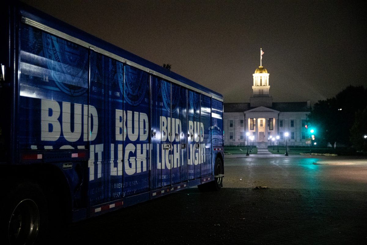 A Bud Light truck delivers alcohol to Joe’s Place at 4:00 a.m. on Iowa Avenue in Iowa City on Friday, Sept. 22, 2023. Nearly 10 years ago, the University of Iowa was ranked the number one party school in the nation. A diet report recently unveiled the low average health of Iowans. 