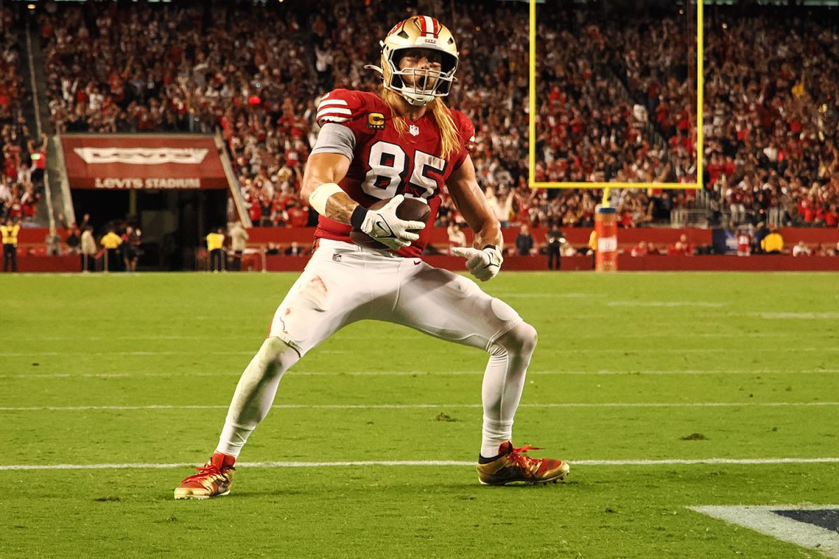 Oct 27, 2024; Santa Clara, California, USA; San Francisco 49ers tight end George Kittle (85) celebrates after scoring a touchdown against the Dallas Cowboys during the third quarter at Levi's Stadium. Mandatory Credit: Kelley L Cox-Imagn Images