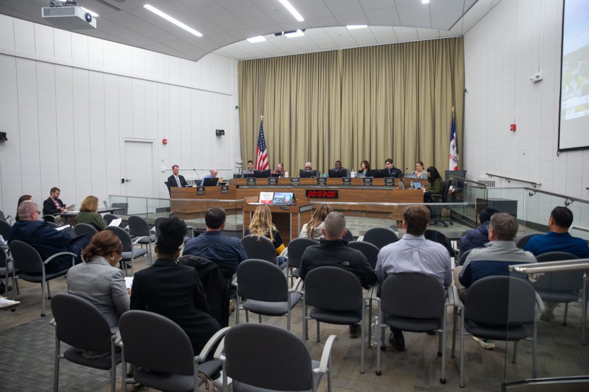 Community and council members gather during an Iowa City City Council meeting at City Hall in Iowa City on Tuesday, Oct. 15, 2024. 