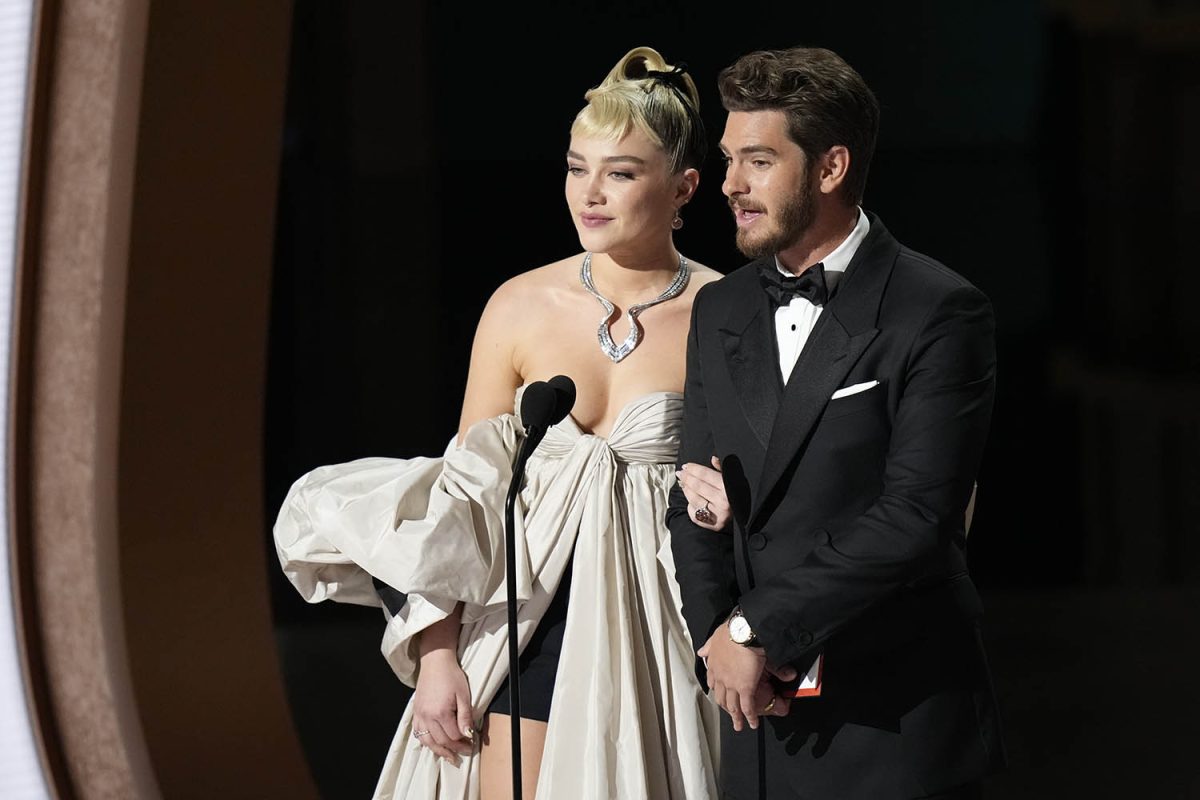 Mar 12, 2023; Los Angeles, CA, USA; Florence Pugh and Andrew Garfield present the award for best original screenplay during the 95th Academy Awards at the Dolby Theatre at Ovation Hollywood in Los Angeles on Sunday, March 12, 2023. Mandatory Credit: Jack Gruber-USA TODAY