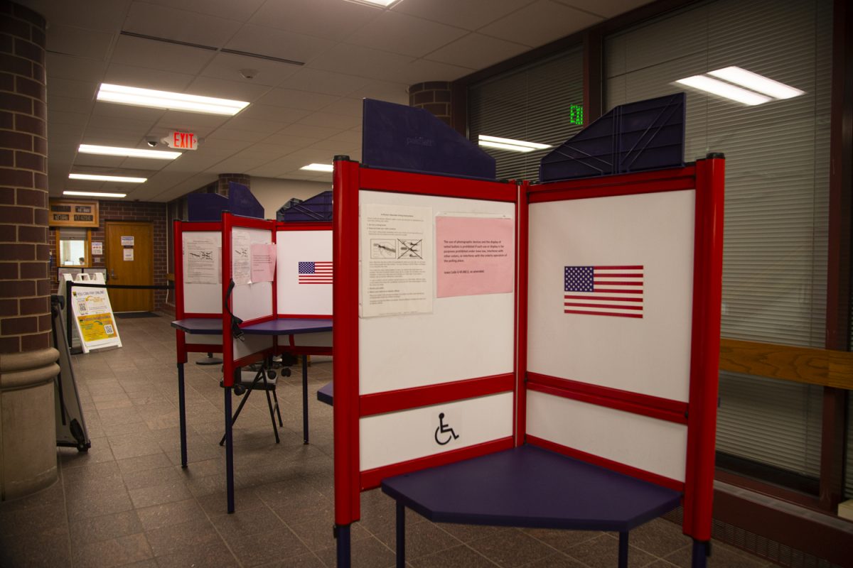 Polling booths are seen during early voting at the Johnson County Auditor’s Office in Iowa City on Wednesday, Oct. 25, 2023. Climate change, although not ranked in the top three issues for the upcoming election, is a high priority for some Iowa voters. 