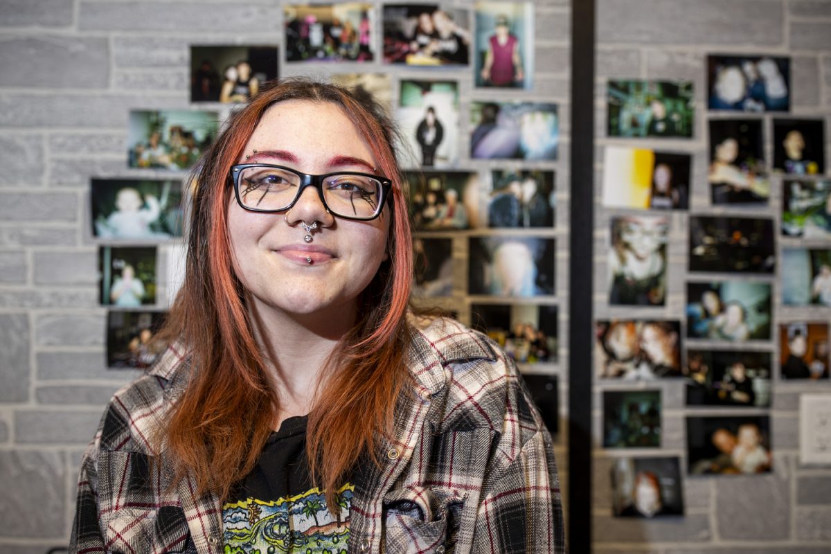 Nikkia Evans poses for a portrait at Neon Dragon Tattoo & Body Piercing in Cedar Rapids on Oct. 16, 2024. Evans has been an apprentice at Neon Dragon for a little over a year. 