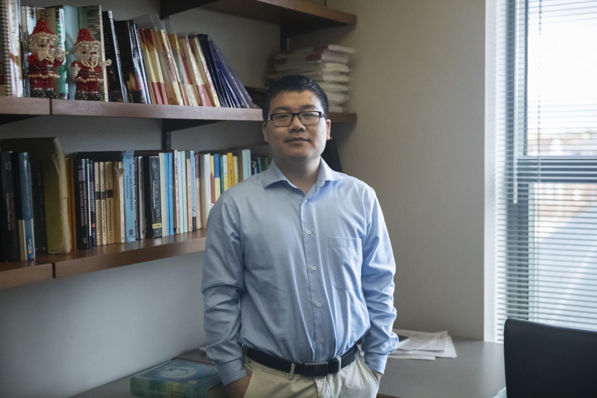 Qihang Lin poses for a portrait at his office in the Pappajohn Business Building on Thursday, Oct. 31, 2024. Lin is working to develop algorithms to reduce bias in certain artificial intelligence models.