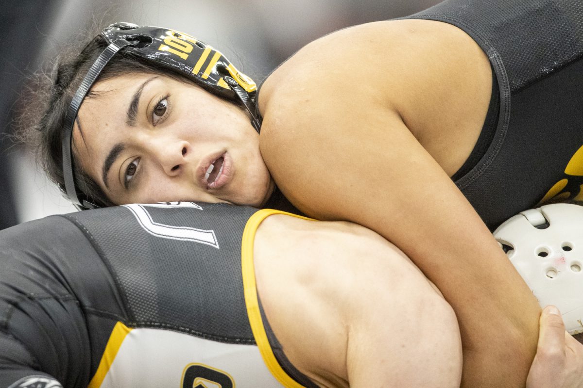 Iowa 110-pound Valarie Solorio wrestles Quincy University Sereena Baca during the Luther Hill Open Titles at the Blake Field House in Indianola, Iowa, on Saturday, Nov. 2, 2024. Iowa ended the tournament with six champions and an overall record of 58-17. 