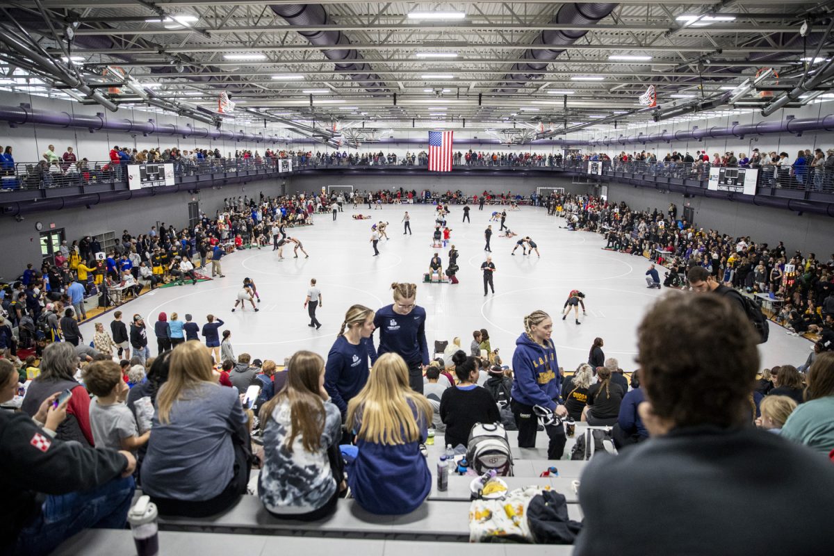 Wrestlers compete during the Luther Hill Open Titles at the Blake Field House in Indianola, Iowa, on Saturday, Nov. 2, 2024. Iowa ended the tournament with six champions and an overall record of 58-17. 