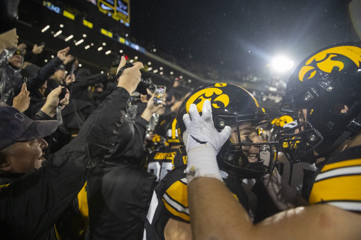 Hawkeyes celebrate after a football game between Iowa and Wisconsin at Kinnick Stadium on Saturday, Nov. 2, 2024. The Hawkeyes defeated the Badgers 42-10. (Emma Calabro/The Daily Iowan)