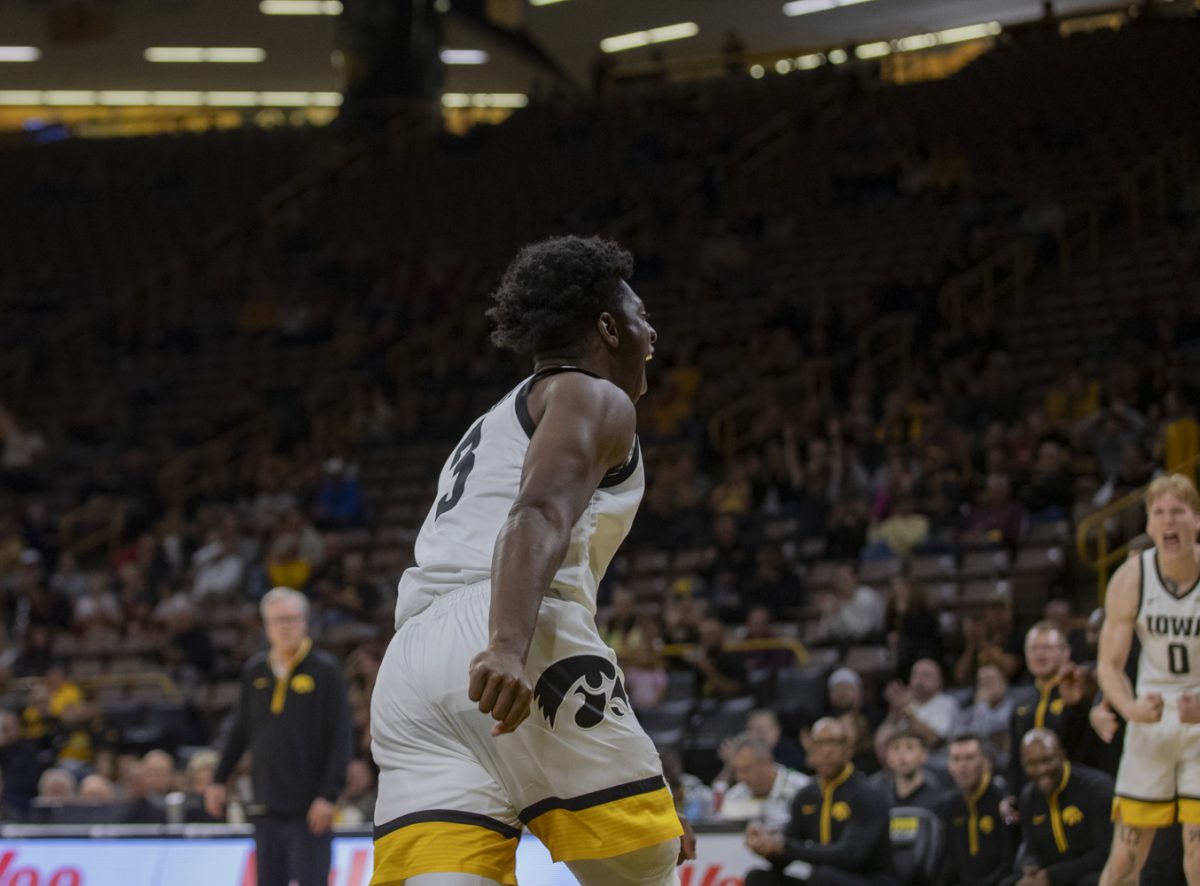 Iowa guard Drew Thelwell celebrates a fast break dunk during an Iowa mens basketball game against Texas A&M Commerce at Carver-Hawkeye Arena in Iowa City on Monday, Nov 4, 2024. Thelwell contributed 10 of the 32 points scored by Iowa’s bench. The Hawkeyes defeated the Lions 89-67.