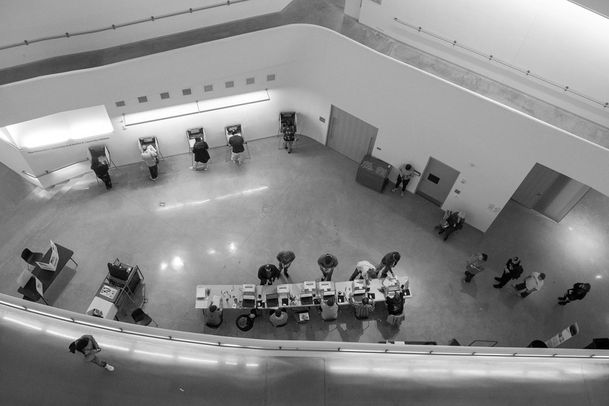 Voters cast their ballots at the Visual Arts Building on Election Day in Iowa City on Tuesday, Nov. 5, 2024.