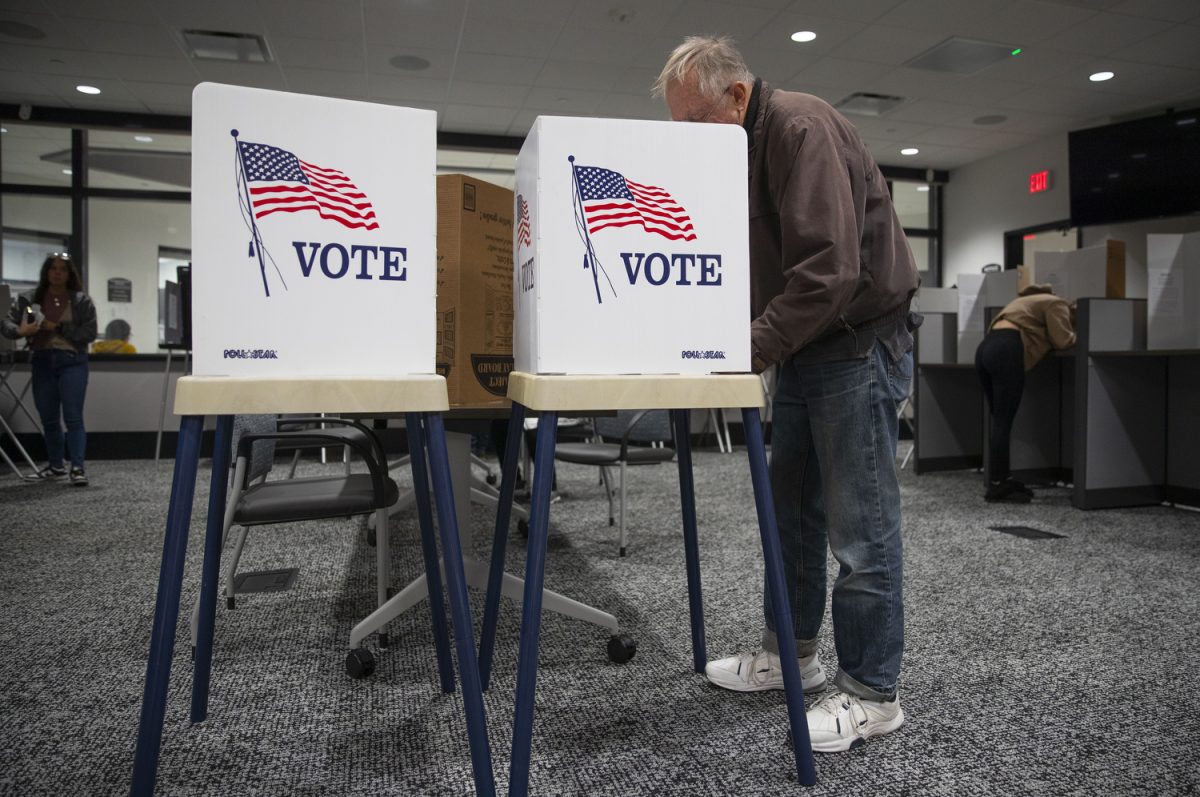 A man is fills out his ballot in Elkhorn City Hall on Election Day in Elkhorn, Wisconsin, on Tuesday, Nov. 5, 2024. As of 2023, Elkhorn has a population of 10,230 people. Elkhorn City Hall has been the polling location for City of Elkhorn residents as of 2022, accommodating all size elections. Polls in the city hall opened at 7:00 a.m. and close at 8:00 p.m.