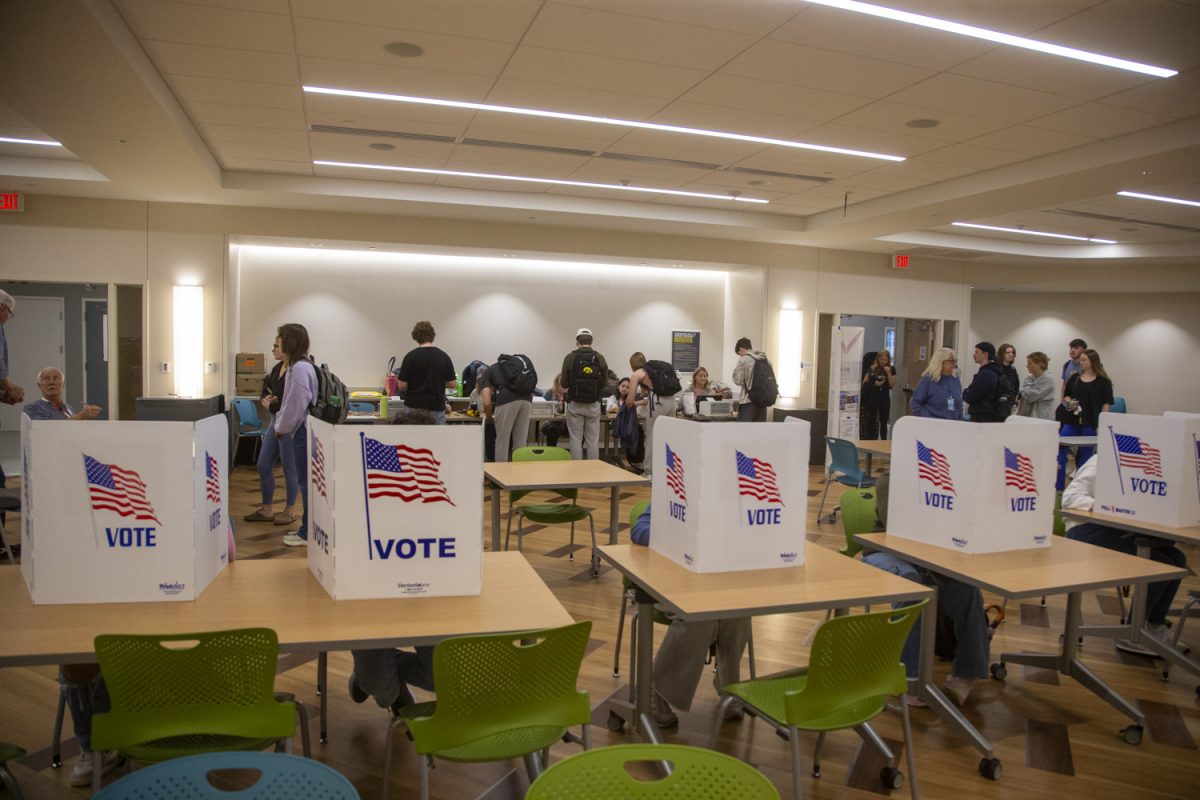 Voters line up to fill out their ballots at Catlett Residence Hall on Election Day in Iowa City on Tuesday, Nov. 5, 2024.