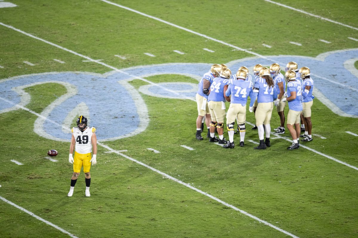 UCLA players huddle during a football game between Iowa and UCLA at the Rose Bowl Stadium in Pasadena, Calif. on Friday Nov. 8, 2024. The Bruins defeated the Hawkeyes 20-17.