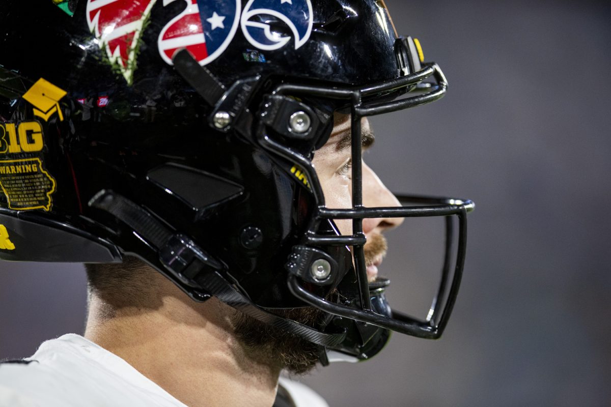 Iowa quarterback Brendan Sullivan looks at a teammate during a football game between Iowa and UCLA at the Rose Bowl Stadium in Pasadena, Calif. on Friday Nov. 8, 2024. The Bruins defeated the Hawkeyes 20-17.