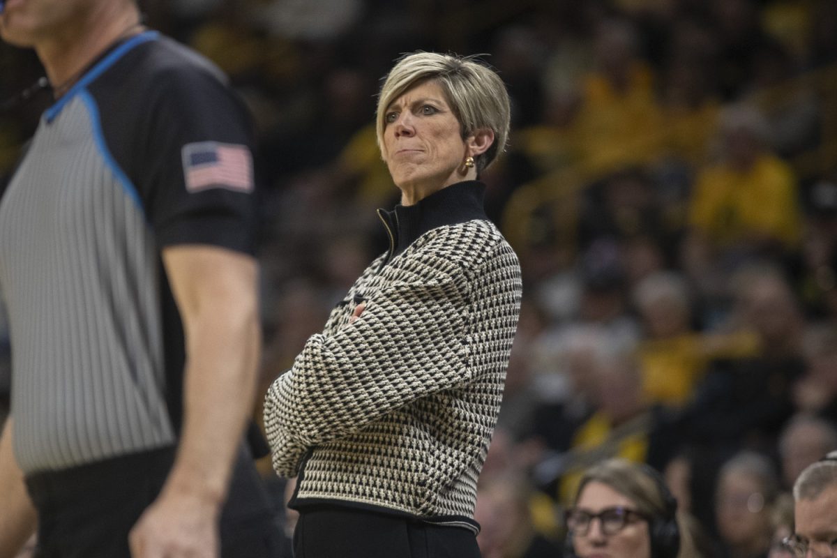 Iowa Head Coach Jan Jensen pays close attention to a Hawkeye defensive possession during an Iowa women’s basketball game at Carver-Hawkeye arena in Iowa City on Wednesday Nov, 13, 2024. The Hawkeyes defeated Toledo 94-57.