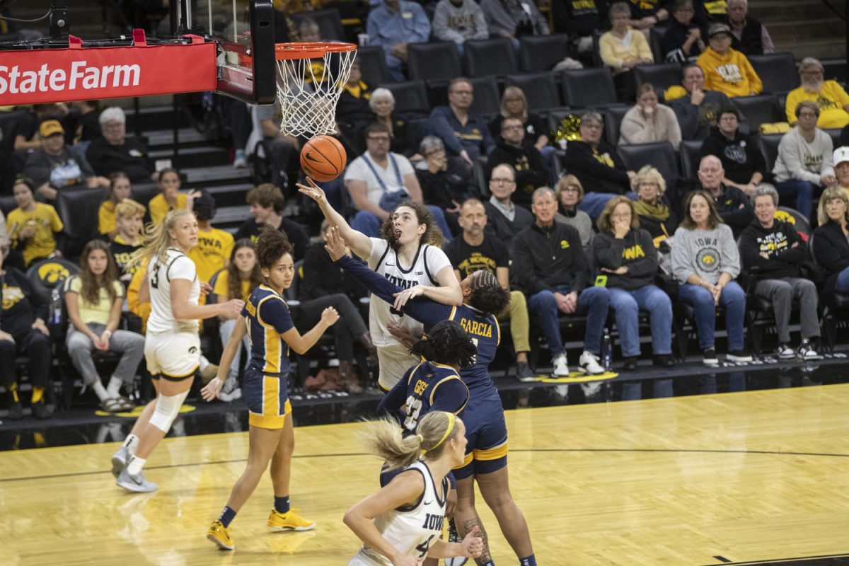 Iowa forward Ava Heiden puts up a contested layup during an Iowa women’s basketball game at Carver-Hawkeye arena in Iowa City on Wednesday Nov, 13, 2024. The Hawkeyes defeated Toledo 94-57.