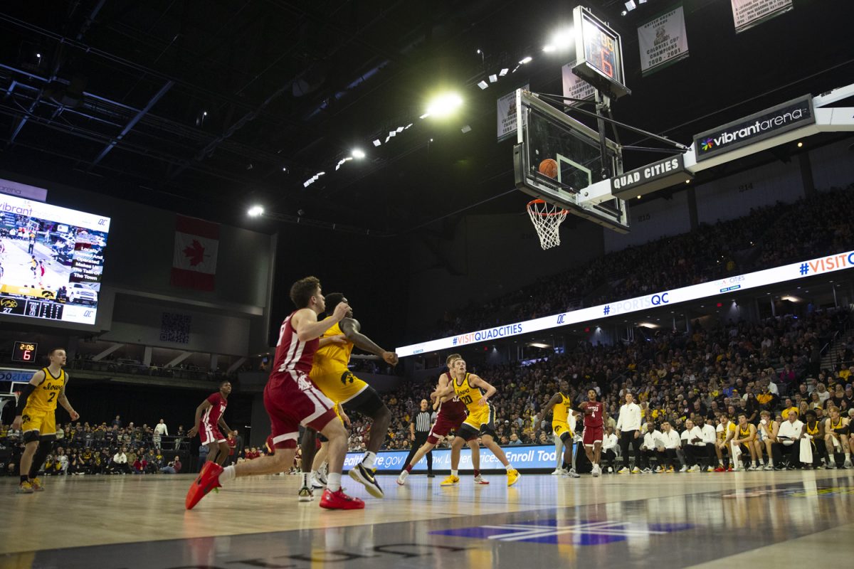 The Hawkeyes defend against the Coyotes during a men's basketball game between Iowa and Washington State at Vibrant Arena in Moline, Illinois, on Friday, Nov. 15, 2024.