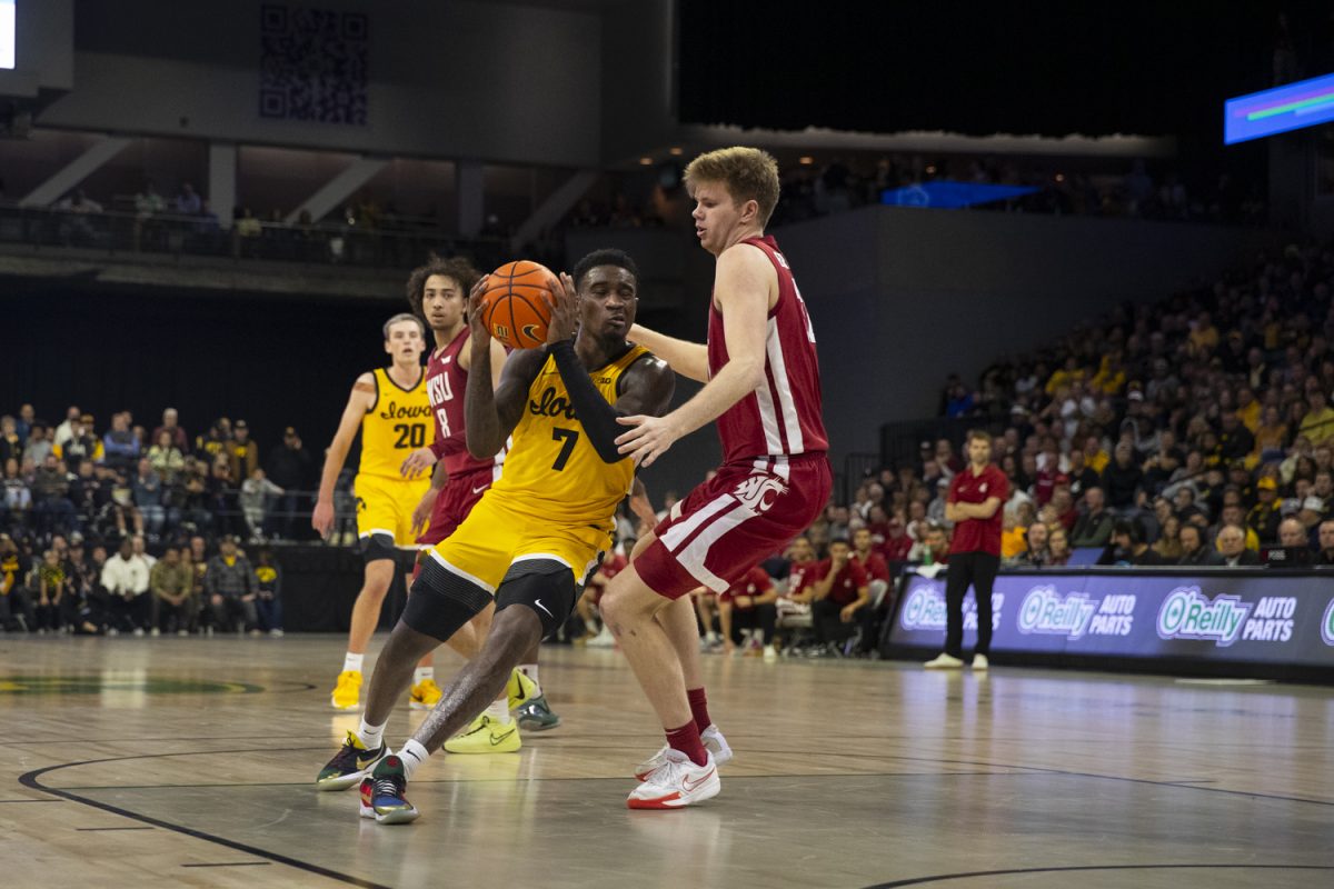 Iowa forward Seydou Traore goes in for a layup during a men's basketball game between Iowa and Washington State at Vibrant Arena in Moline, Illinois, on Friday, Nov. 15, 2024. The Hawkeyes defeated the Cougars 76-66.