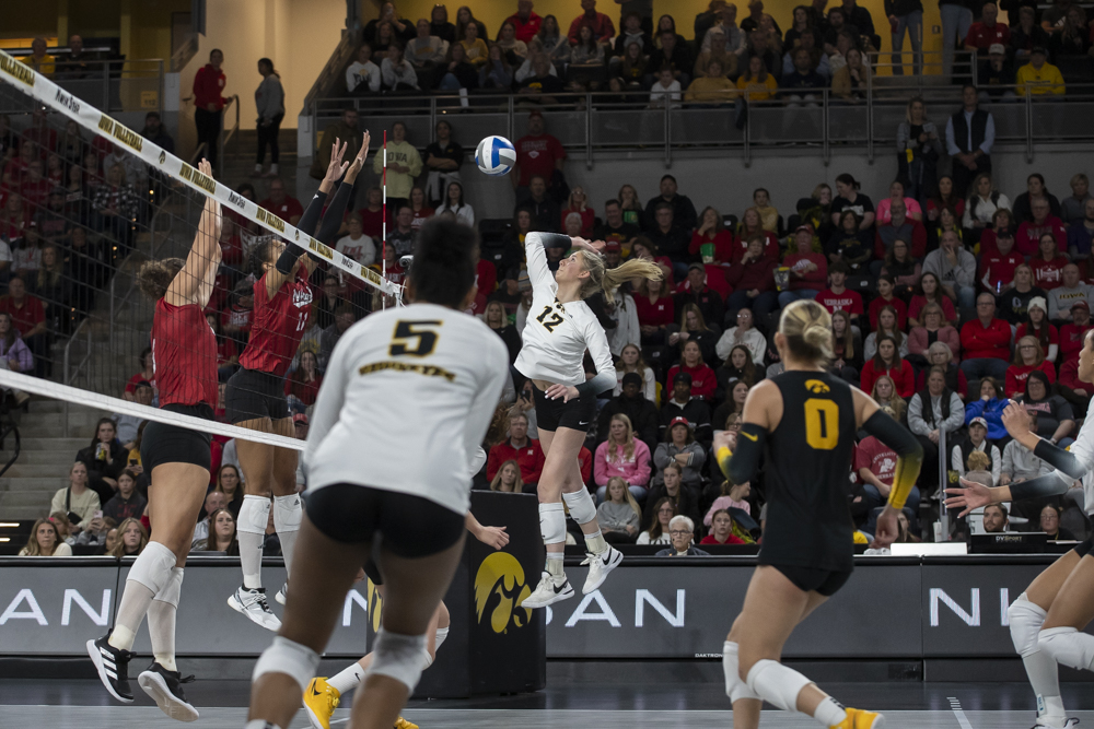 Iowa middle hitter Hannah Whittingstall spikes the ball during a women’s volleyball game between Iowa and Nebraska at Xtream Arena in Coralville on Wednesday, Nov. 20, 2024.  The Huskers defeated the Hawkeyes in a sweep 3-0.