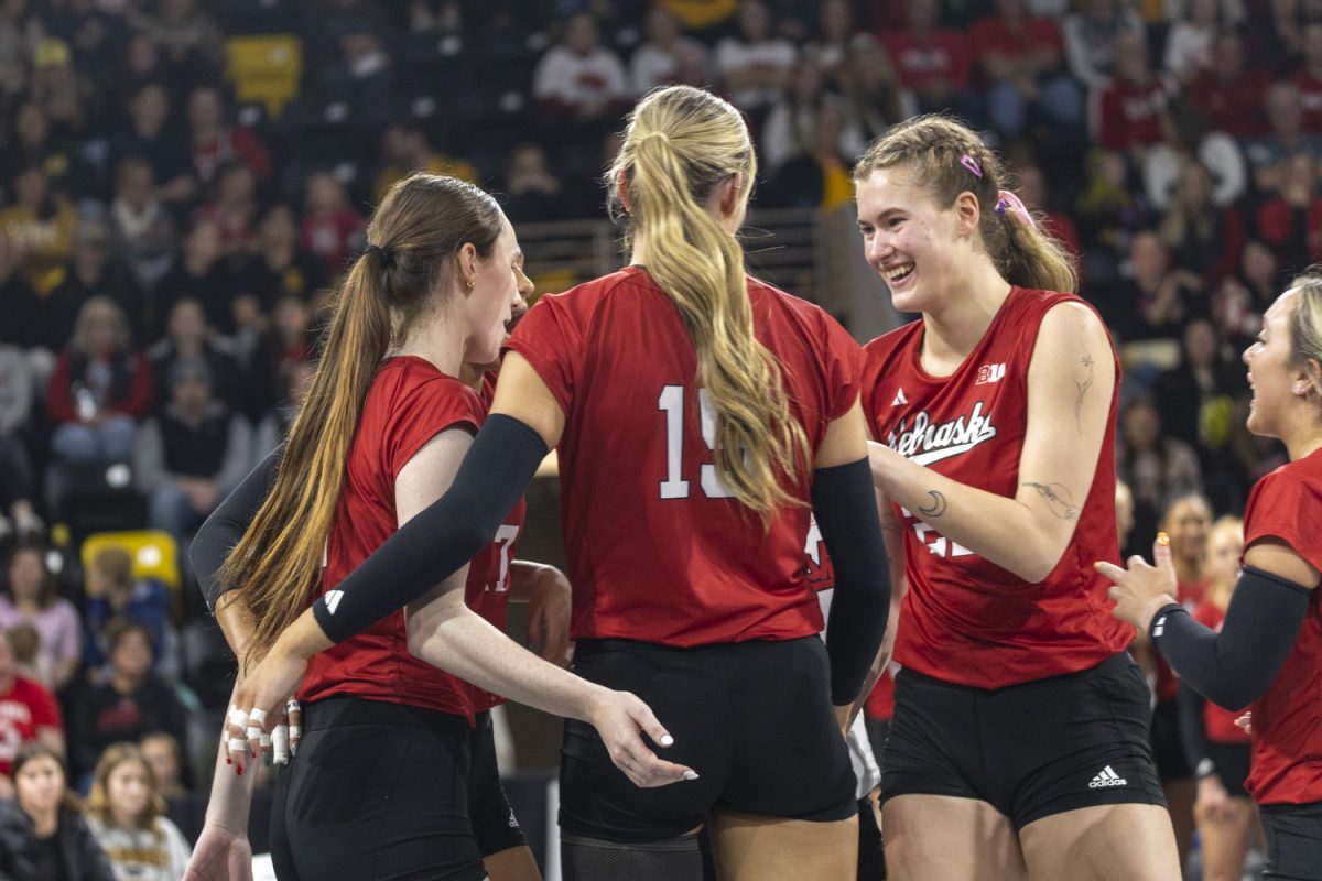 Nebraska players huddle during a volleyball match between Iowa and Nebraska at Xtream Arena in Coralville on Wednesday, Nov. 20, 2024. The Cornhuskers defeated the Hawkeyes in a 3-0 sweep.