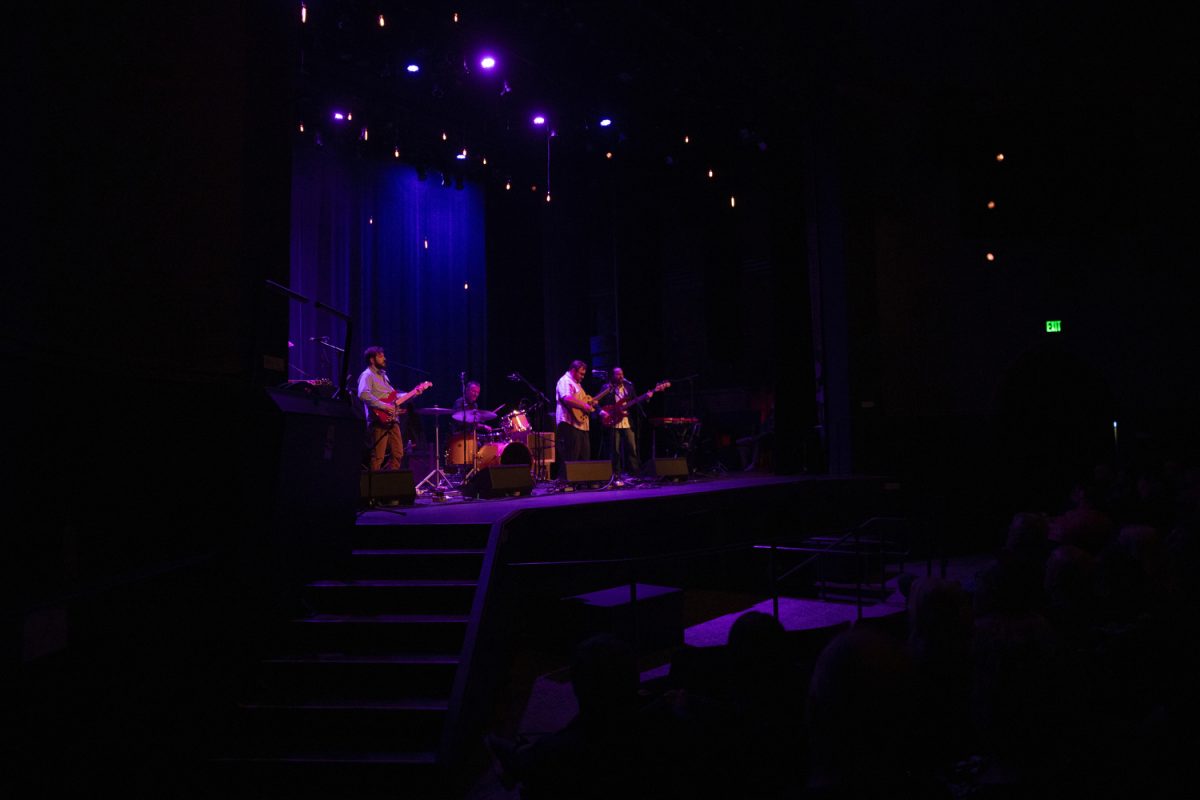 Los Lobos performs at the Englert Theatre in Iowa City for their 50th Anniversary Tour on Nov. 20, 2024. The opener, the Dave Helmer Band, plays their third song.