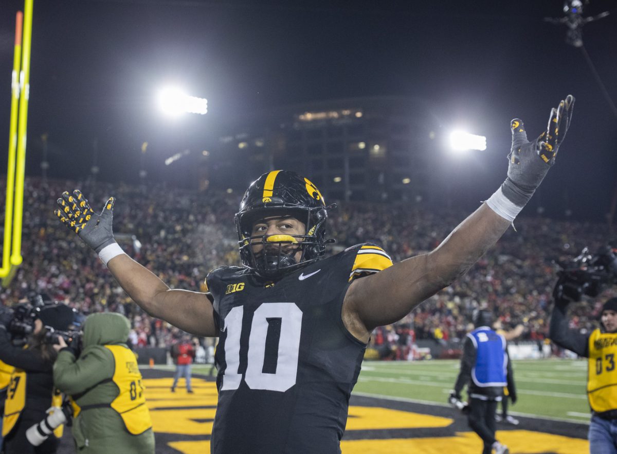 Iowa linebacker Nick Jackson celebrates an Iowa win after a football game between Iowa and Nebraska at Kinnick Stadium in Iowa City on Friday, Nov. 29, 2024. Iowa defeated Nebraska, 13-10.