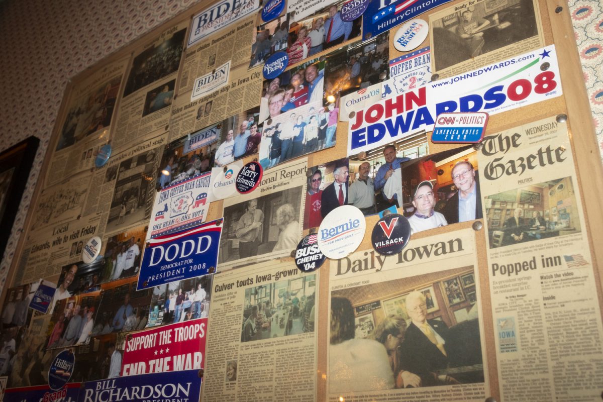 Old newspapers and photos are seen on the walls of Hamburg Inn No. 2 in Iowa City on Nov. 1. The Hamburg Inn has a tradition of presidential and congressional candidates visiting the restaurant on their campaign trails.