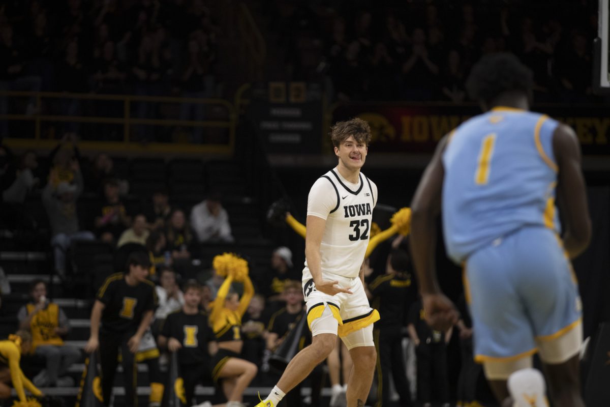 Owen Freeman celebrates a 3-pointer during the Iowa Men’s basketball game against Southern University on Nov. 7 at Carver Hawkeye Arena in Iowa City, Iowa. The Hawkeye men battled and won 89-74 over the Jaguars.