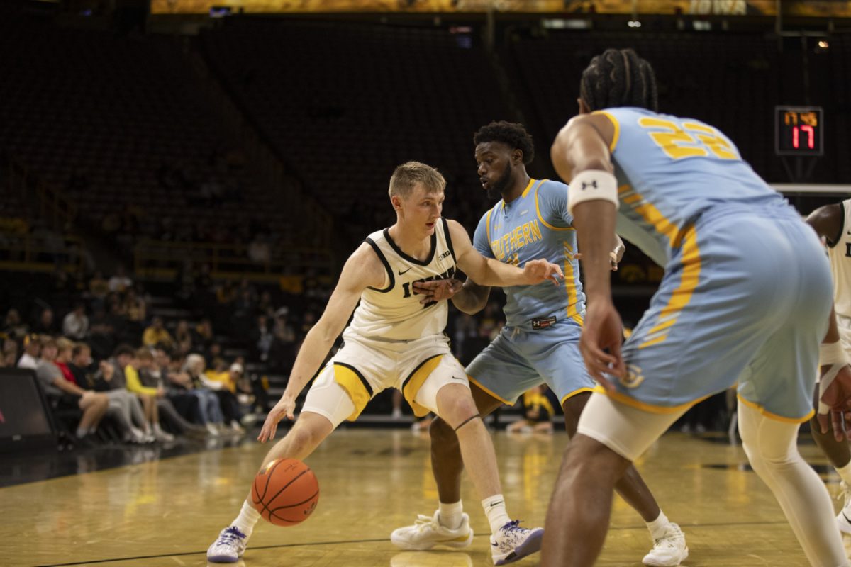 Joash Dix dribbles through Southern defense during the Iowa Men’s basketball game against Southern University on Nov. 7 at Carver Hawkeye Arena in Iowa City, Iowa. The Hawkeye men battled and won 89-74 over the Jaguars.