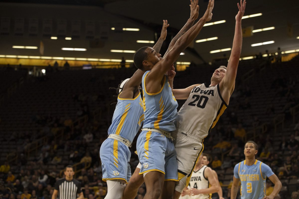 Payton Sandfort is fouled during the Iowa Men’s basketball game against Southern University on Nov. 7 at Carver Hawkeye Arena in Iowa City, Iowa. The Hawkeye men battled and won 89-74 over the Jaguars.