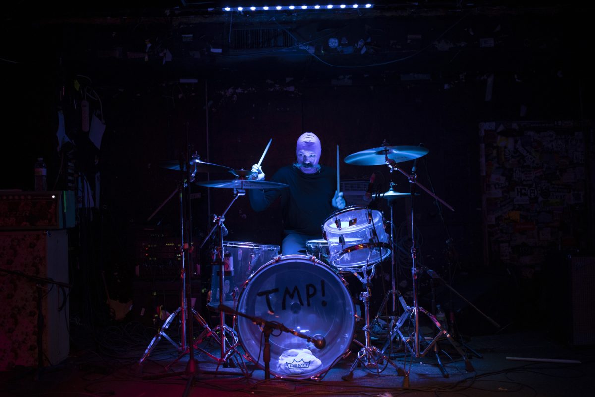 Tiny Moving Parts drummer, Bill Chester, plays during Tiny Moving Parts show at Gabe’s in Iowa City on Thursday, Oct. 31, 2024. Bands Greywind and Action/Adventure opened and audience and band members were dressed up for Halloween.