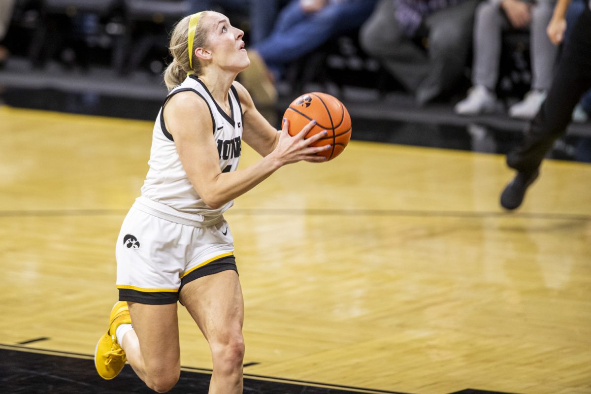 Iowa guard Kylie Feuerbach goes up for a shot during a women’s basketball game between Iowa and Northern Illinois at Carver-Hawkeye Arena in Iowa City on Wednesday, Nov. 6, 2024. Following the half the Hawkeyes lead the Huskies 45-34.