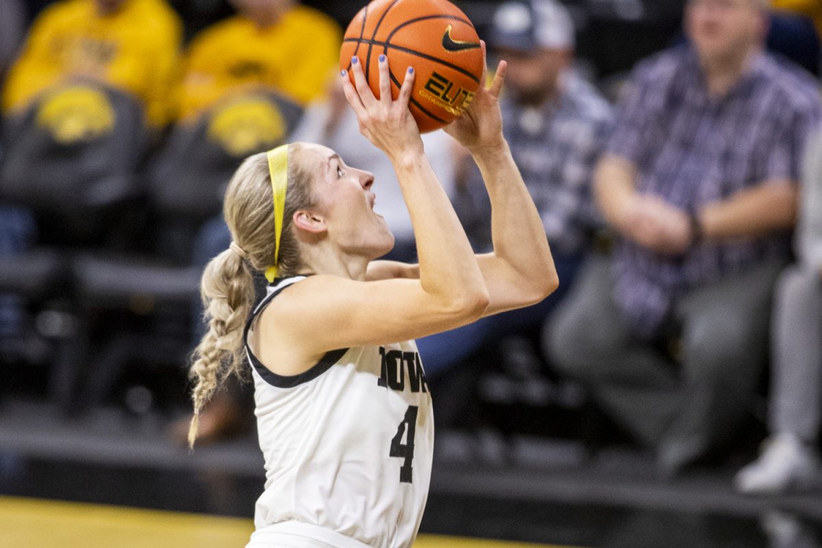 Iowa guard Kylie Feuerbach goes up for a shot during a women’s basketball game between Iowa and Northern Illinois at Carver-Hawkeye Arena in Iowa City on Wednesday, Nov. 6, 2024. Following the half the Hawkeyes lead the Huskies 45-34.