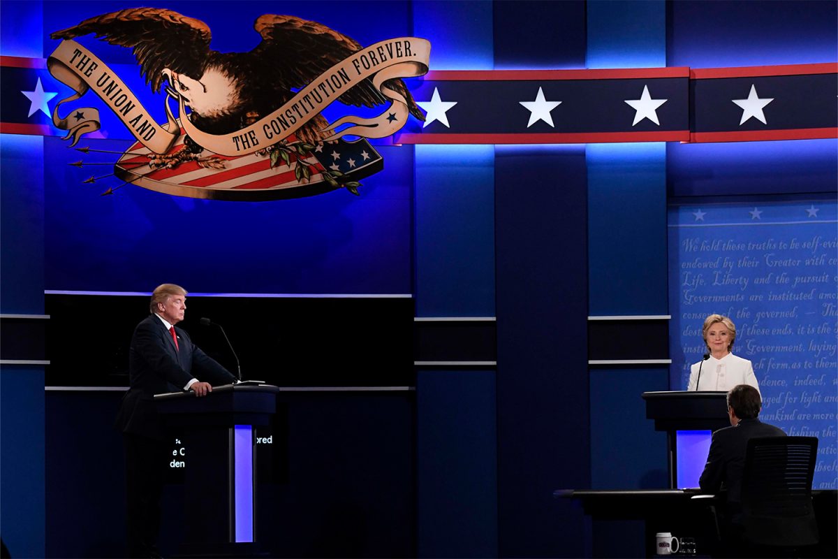 Oct 19, 2016; Las Vegas, NV, USA; Democratic presidential candidate Hillary Clinton and Republican presidential candidate Donald Trump during the third and final presidential debate at University of Nevada Las Vegas. 