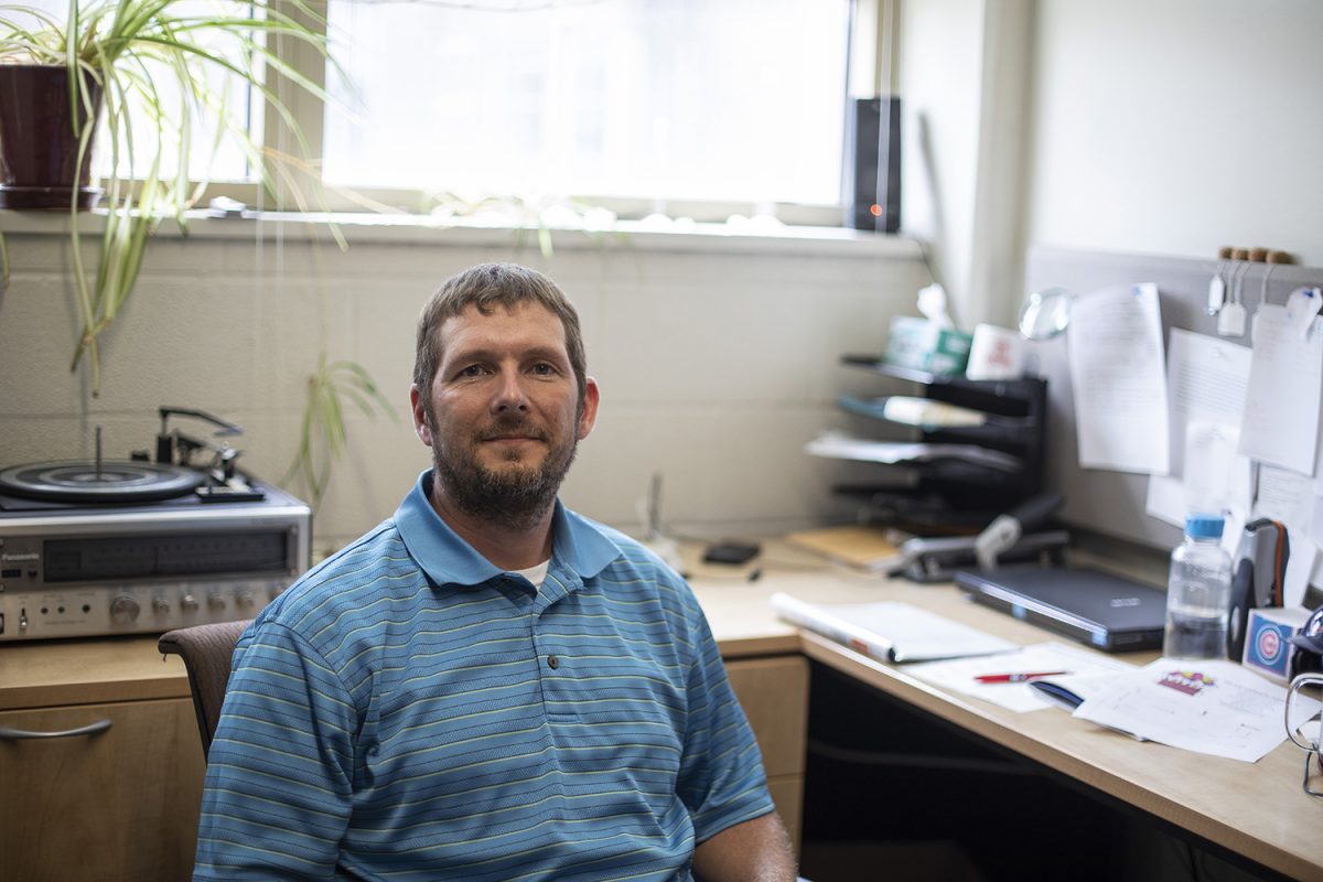 UI Chemistry associate professor Scott Shaw poses for a portrait in his office in the Chemistry Building on July 18, 2019. Shaw created the Rural Scholar Program for select incoming students in 2015. Shaw recently received a grant of $9 million to continue studying environmental films or grime.