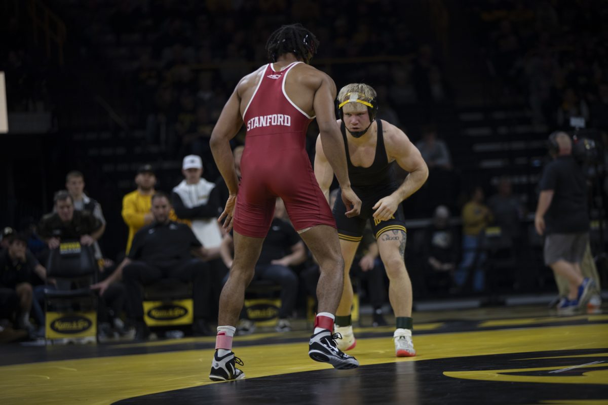 Iowa No. 6 174-pound Nelson Brands vs. Stanford No. 17 Lorenzo Norman during No. 2 Iowa’s first home dual against No. 20 Stanford at Carver-Hawkeye Arena in Iowa City on Saturday, Nov. 9, 2024. The Hawkeyes defeated the Tree, 32-9. Norman defeated Brands, 4-1.