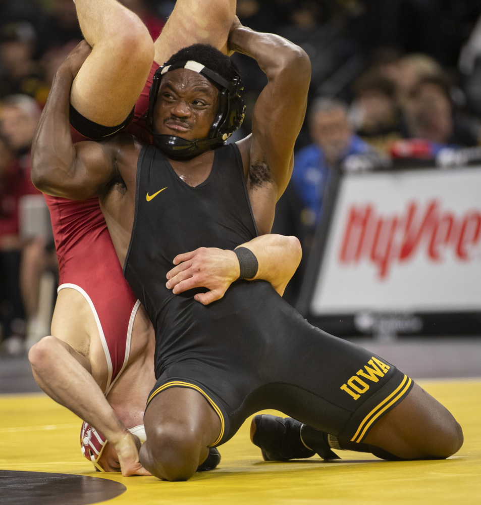 Iowa No.1 157-pound Jacori Teemer wrestles Stanford 157-pound Grigor Cholakyan during No. 2 Iowa’s first home dual against No. 20 Stanford at Carver-Hawkeye Arena in Iowa City on Saturday, Nov. 9, 2024. The Hawkeyes defeated the Tree, 32-9. Teemer defeated Cholakyan, 13-3.