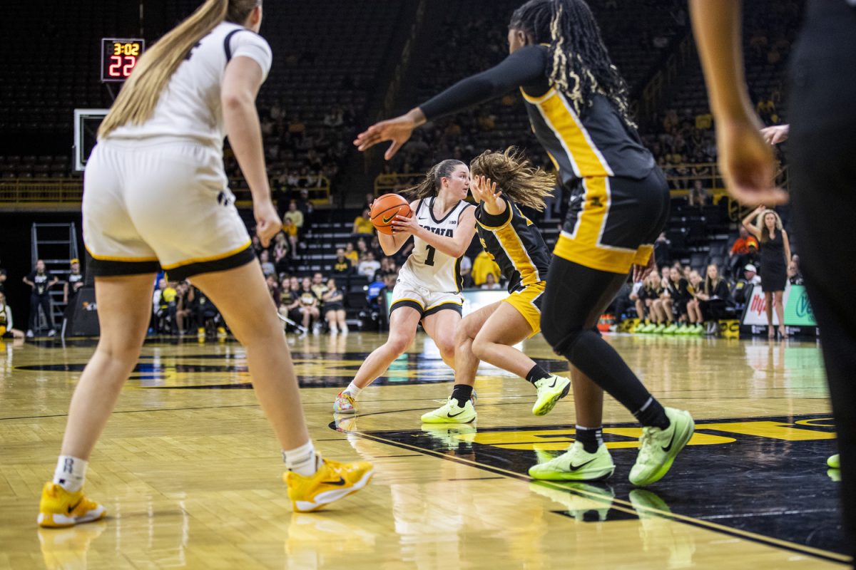 Iowa guard Taylor Stremlow prepares to pass the ball during a women’s basketball game between Iowa and Missouri Western State at Carver-Hawkeye Arena in Iowa City on Wednesday, Oct. 30, 2024. The Hawkeyes defeated the Griffons 110-55. 