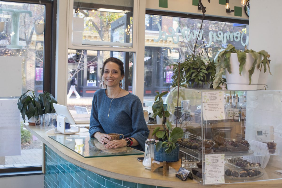 Monique Holtkamp poses for a portrait at T’Spoons in the Pedestrian Mall in Iowa City on Nov. 15. T’Spoons is located in the Old Capitol Mall, and Holtkamp also owns a Sweets and Treats location in the Pedestrian Mall.