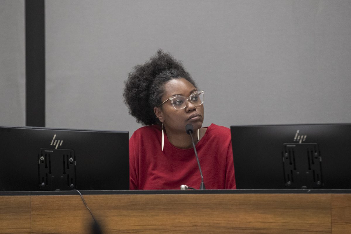 Chastity Dillard addresses the room during a meeting of the Truth and Reconciliation Commission at Iowa City City Hall on Thursday, Dec. 5, 2024.