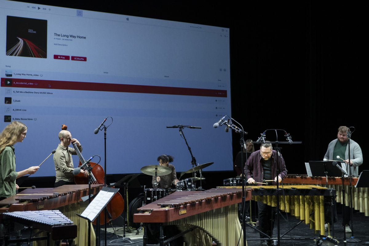 Faculty member Dan Moore and others perform a concert for his album The Long Way Home in Voxman Music Building on Monday, Dec. 9, 2024. Moore and the ensemble perform his composition Once a Song is Sung (the song is freed).