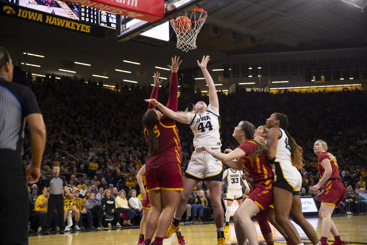 Addison O’Grady goes up for a shot during the Iowa Corn Cy-Hawk Series, a basketball game between Iowa and Iowa State at Carver-Hawkeye Arena in Iowa City on Wednesday, Dec. 11, 2024. The Hawkeyes defeated the Cyclones 75-69.